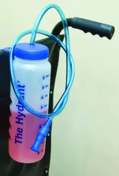 water bottle with tube on back of a wheelchair