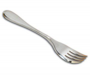 Image shows the metal Knork knife and fork in one, on a white background