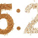 Image showing grains and rice in the shape of the numbers "5:2"
