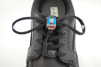 Greeper laces with a thomas tank engine toggle