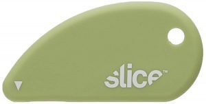Image shows the elongated, oval shaped safety slicer in a soft green colour